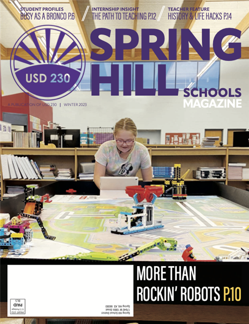 Cover of the Fall 2023 Spring Hill Schools Magazine with one SHES student on iPad at robotics table